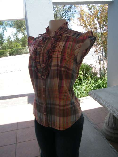 Colourful checked sleeveless top with high frilled collar.By RE size 34/10.Button down front.