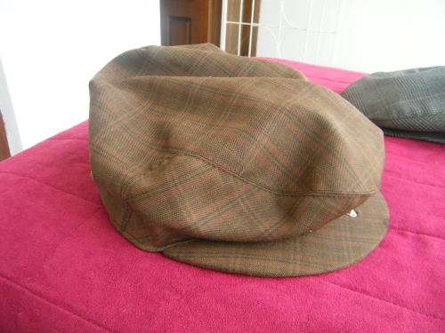 Sir Henry Rutland Country Cap in brown check fabric.Size Large.As new
