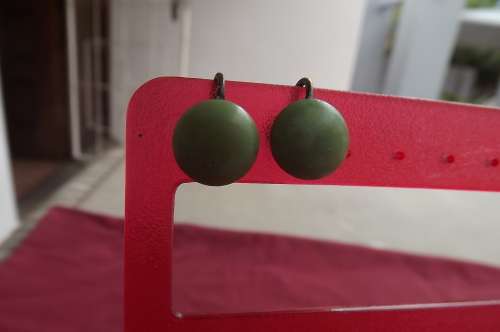 Pair of small green screw on vintage earrings. Used but in good condition