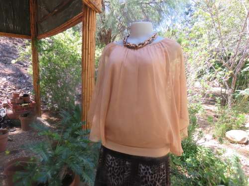 Smart pull over stretch polycotton top with sheer creased polyester overlay..Caramel colour.