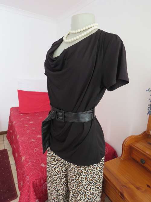 lovely black stretch polyester short sleeve top by JUDY'S PRIDE.Size 34/10 with cowl neckline.