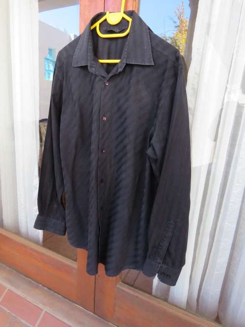 Black long sleeve Men's shirt by EXACT in size L.In 100% cotton.Used but good.