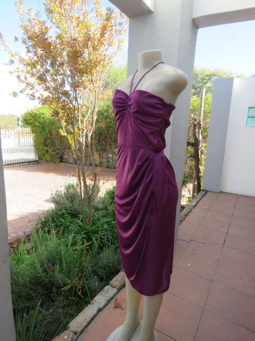 Purple evening dress by 'DESIGN ROMAN' IN 33/9.In polyester/nylon blend fabric.Good condition.