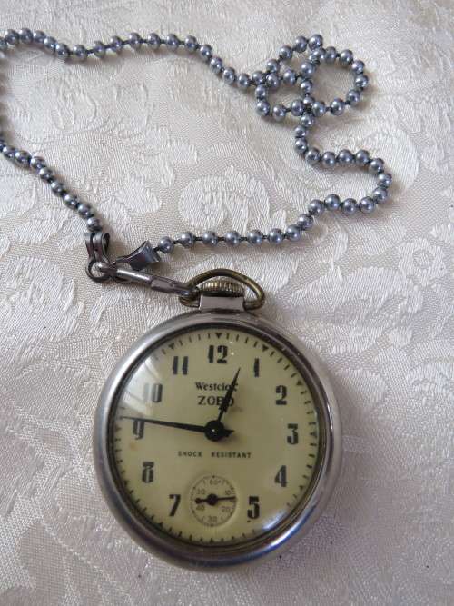 'ZOBO WESTCLOX' vintage pocket watch with chain in working condition.Made in Canada.