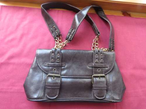 Small choc brown faux leather bag in size 14x27 cm.Military style.Close with 2 zips.As new.