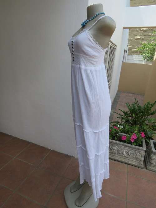 White crinkled cotton maxi dress.Fully lined tiered bottom.Empire waist.Size 32/8.Good condition.