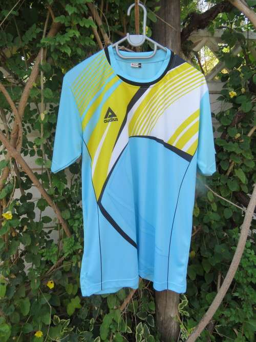 Men's soccer shirt by 'AUDIUS' in light blue,yellow and white.Size M.Chest 100cm.New.