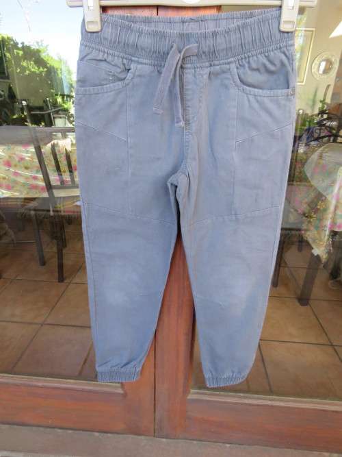 Blue grey long pants for boy of 9-10 yr ld.By 'WOOLWORTHS' in 100% cotton.New condition..