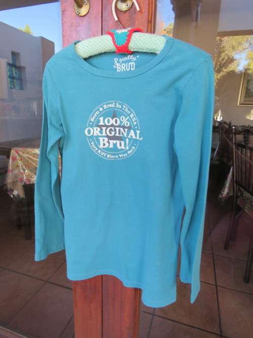 Boys long sleeve 100% cotton T-shirt by 'LOCALLY BRUD' for 9-10 yr old.In turquoise.As new.