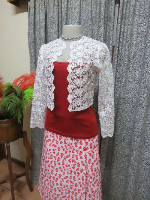 Fabulous white acrylic bolero style short jacket in embossed lace.Boutique made in 32/8.As new.