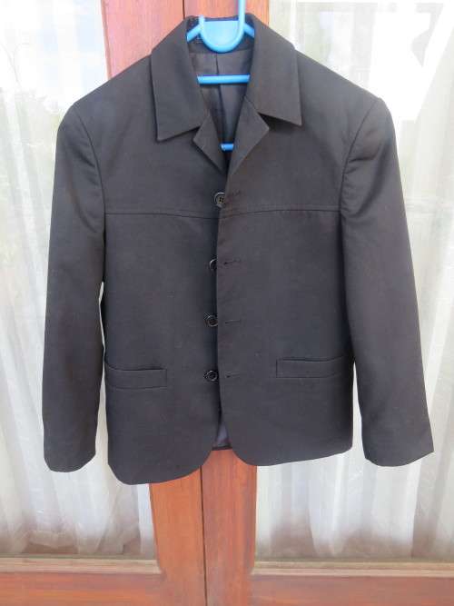 Handsome black  jacket for boy of 9-10 yrs old by `KDS EDGARS`.Very smart for any occasion.New cond.