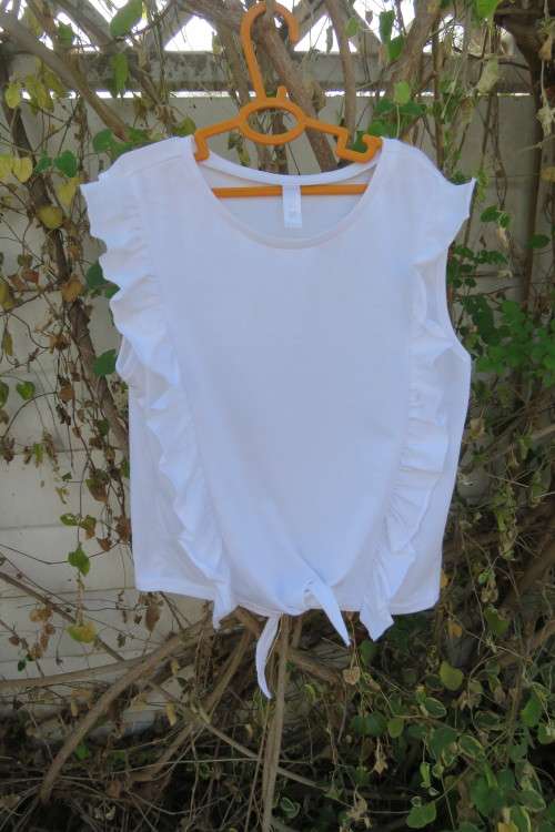Cute snow white fashion top for 11-12 yr old by FASHION INC.Slip over.New condition.
