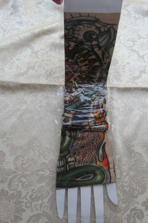 Tattoo fashion collection arm sheath.Fool your friends.In stretch nylon.New.