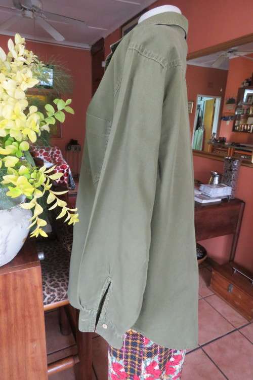 Army green ladies long sleeve casual shirt by 'News' in size 40/16. Two front pockets.