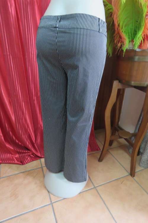 Show stopping low rise black and white striped pants with wide waistband. Size 36/12.