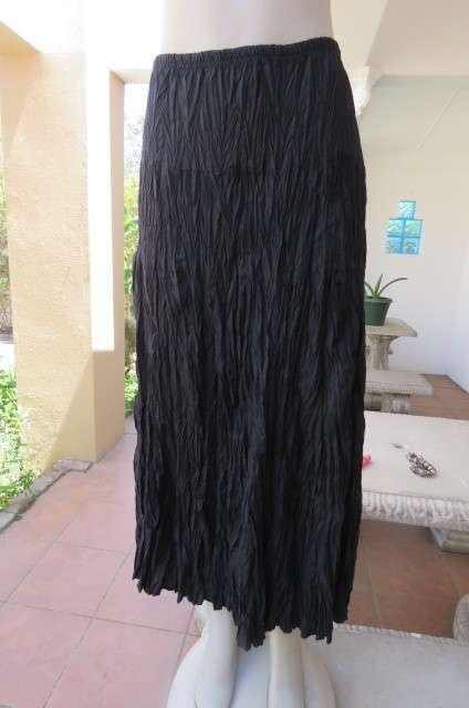 Black long skirt in creased polycotton by 'Edge' in size 36/12. With elasticated waist.