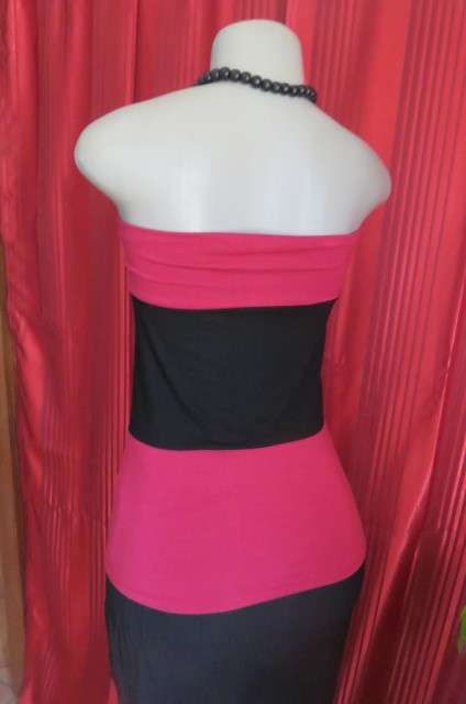 Strapless top in stretch viscose fabric size 34/10. Magenta pink top and seam with black middle area