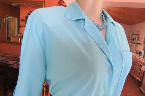 Beautiful cool vintage dress from the 90's in size 40/16 by 'Woolworths'. In 100% polyester.