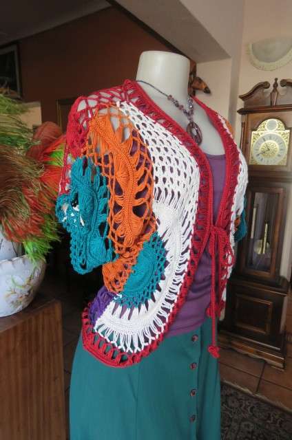 Multicolour bolero combination of knit and crochet stitching size 38/14 by 'Bellezza Signora'.