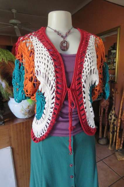 Multicolour bolero combination of knit and crochet stitching size 38/14 by 'Bellezza Signora'.