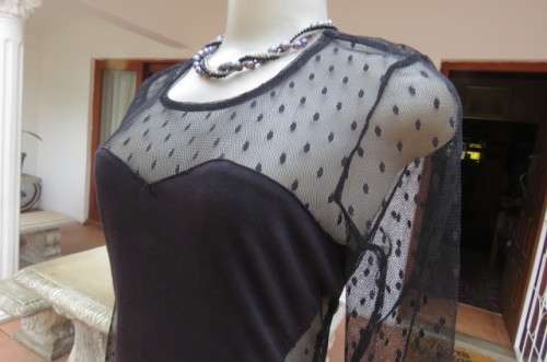 That little black dress! By 'Miss L' in size 38/14 fit size 36/12 good tight fit. Round neckline.