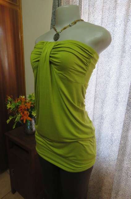 Strapless bright avogreen long top by `Woolworths` in size 34/10. Band over hips. In stretch cotton.