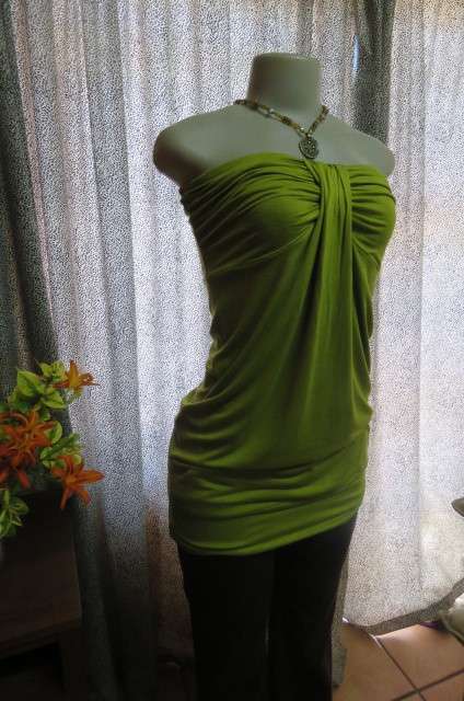 Strapless bright avogreen long top by `Woolworths` in size 34/10. Band over hips. In stretch cotton.