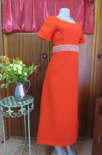 Attractive red maxi owner made empire style dress with short sleeves size 32/8. Very good cond.