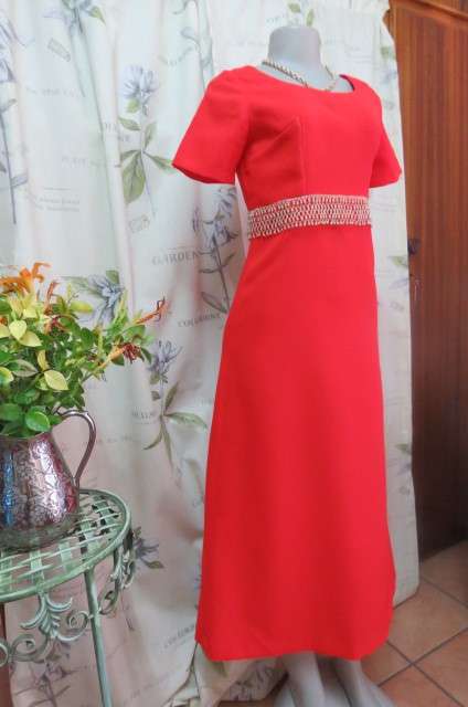 Attractive red maxi owner made empire style dress with short sleeves size 32/8. Very good cond.