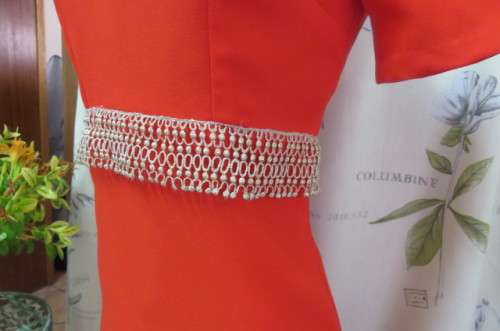 Attractive red maxi owner made empire style dress with short sleeves size 32/8. Very good cond.