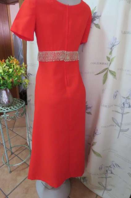 Attractive red maxi owner made empire style dress with short sleeves size 32/8. Very good cond.