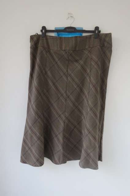 Winter paneled skirt in A-line style by `Jade` in size 48/24. In a heavy polyester and rayon blend.