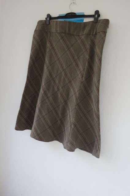 Winter paneled skirt in A-line style by `Jade` in size 48/24. In a heavy polyester and rayon blend.