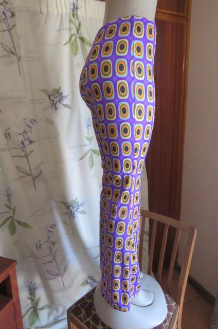 Eyecatching bootlegged polyester stretch pants size 34 to 36 in purple with orange, black+turquoise