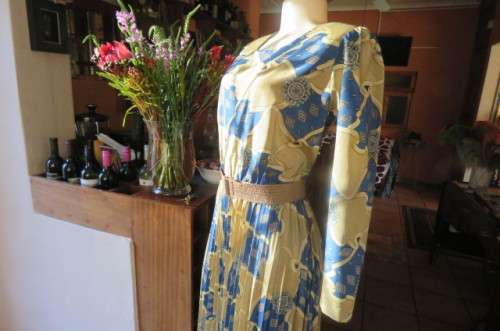 Stunning silky polyester dress with flare consentina pleated bottom size 40/16.