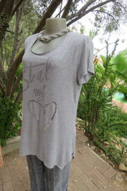 Pretty long slivergrey short sleeve T-shirt with scooped neckline size 36 to 38 by `Woolworths`.