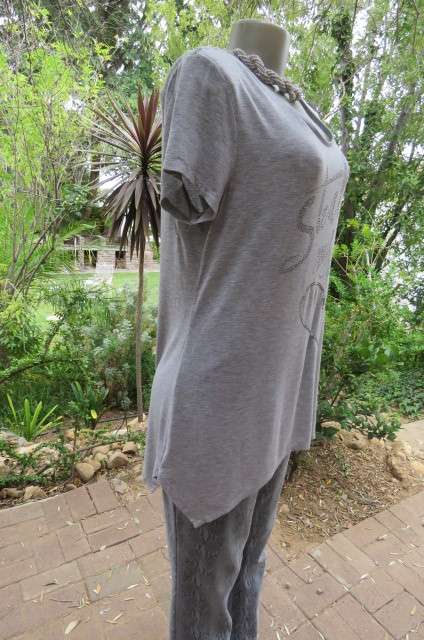 Pretty long slivergrey short sleeve T-shirt with scooped neckline size 36 to 38 by `Woolworths`.