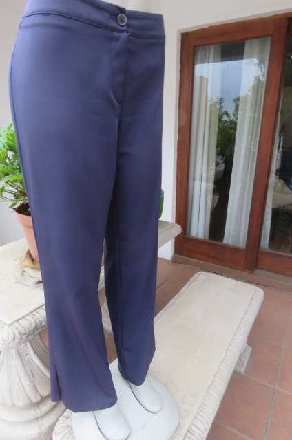 Navy pants by 'Real Clothing' in stretch polyester size 36/12. With straight legs Medium Rise.