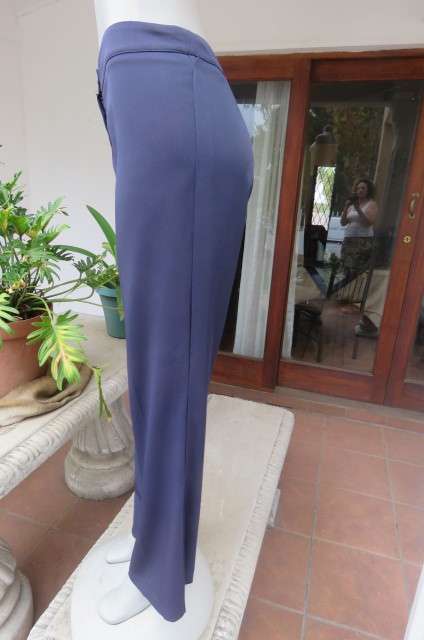 Navy pants by 'Real Clothing' in stretch polyester size 36/12. With straight legs Medium Rise.