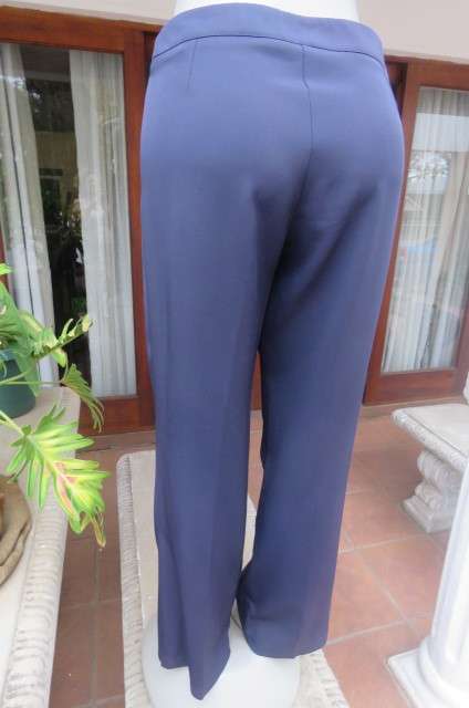 Navy pants by 'Real Clothing' in stretch polyester size 36/12. With straight legs Medium Rise.