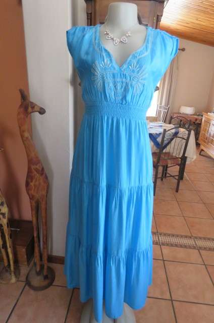 Beautiful light turquoise maxi dress with cream embroidered front and tiered skirt.Size 32/8.As new