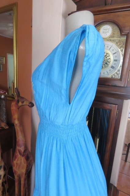 Beautiful light turquoise maxi dress with cream embroidered front and tiered skirt.Size 32/8.As new