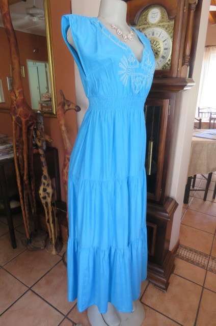 Beautiful light turquoise maxi dress with cream embroidered front and tiered skirt.Size 32/8.As new