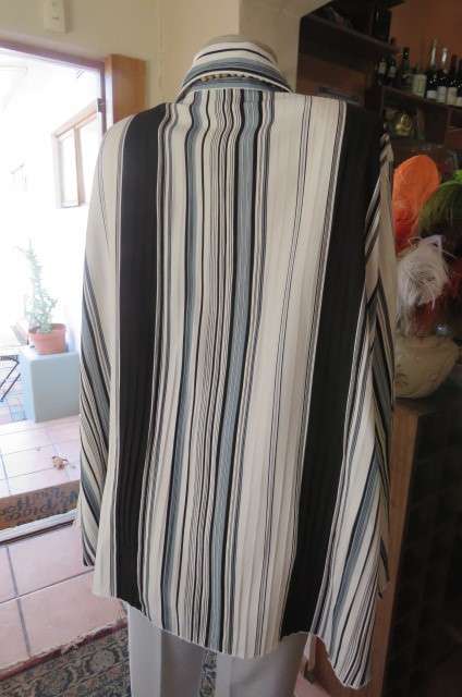 'Donatella' vertical striped long sleeve top in size 48/24 with some permanent pleats.