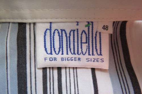 'Donatella' vertical striped long sleeve top in size 48/24 with some permanent pleats.