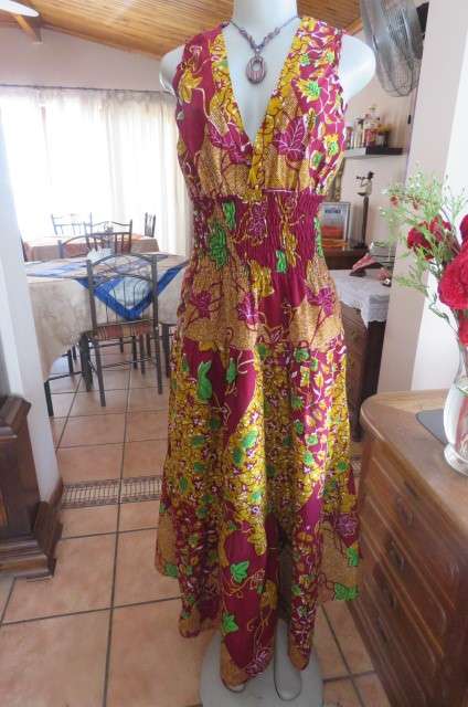 Stunning maxi dress in mustard, maroon and green ethnic design size 38/14. Wide elasticcated waist.