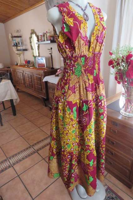 Stunning maxi dress in mustard, maroon and green ethnic design size 38/14. Wide elasticcated waist.