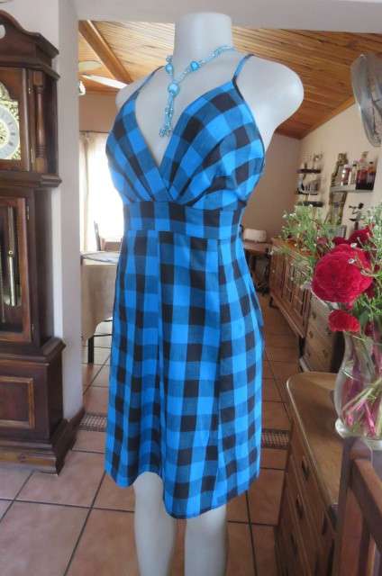 Cute blue and black check strappy dress by 'Legit' in size 40/16. Adjustable straps. Panelled front.
