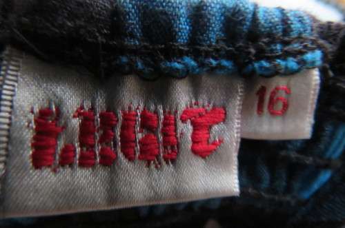 Cute blue and black check strappy dress by 'Legit' in size 40/16. Adjustable straps. Panelled front.