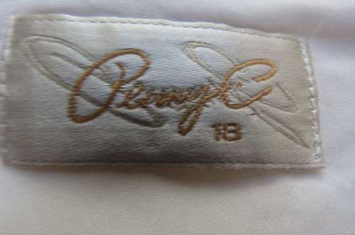 White dream dress by 'Penny C' in size 42/18. In 100% linen. Fully lined with polyester.